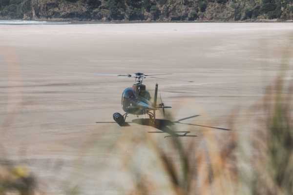 Helicopter landing on the beach