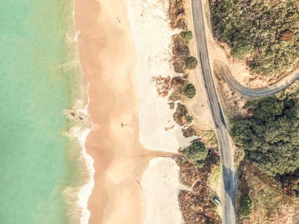 Stunning wide angle aerial drone view of Otama Beach and Black J