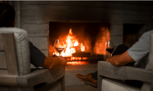 Relax next to a cosy fire at one of our accommodation getaways